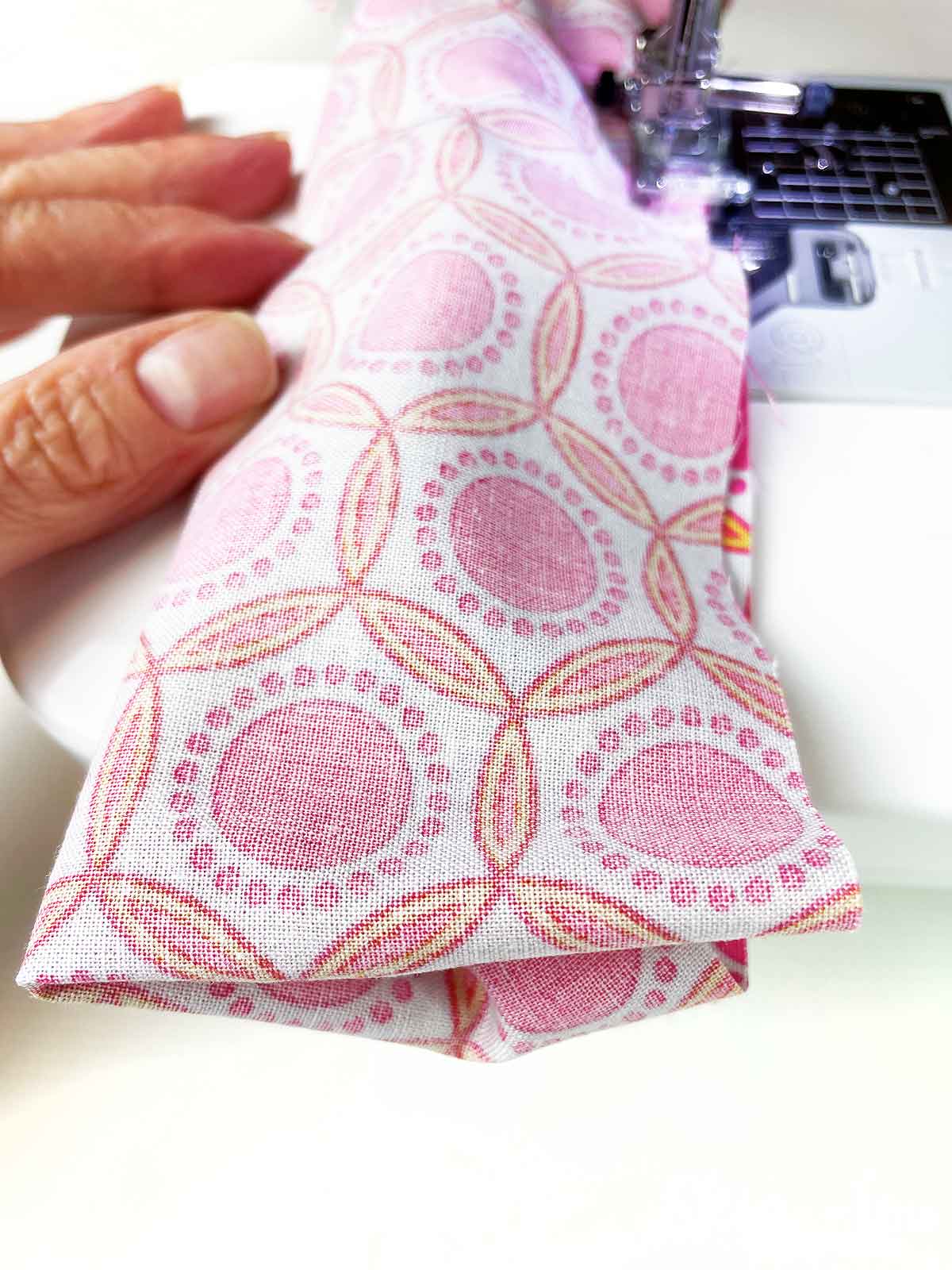 sewing the edges together on the sewing machine 