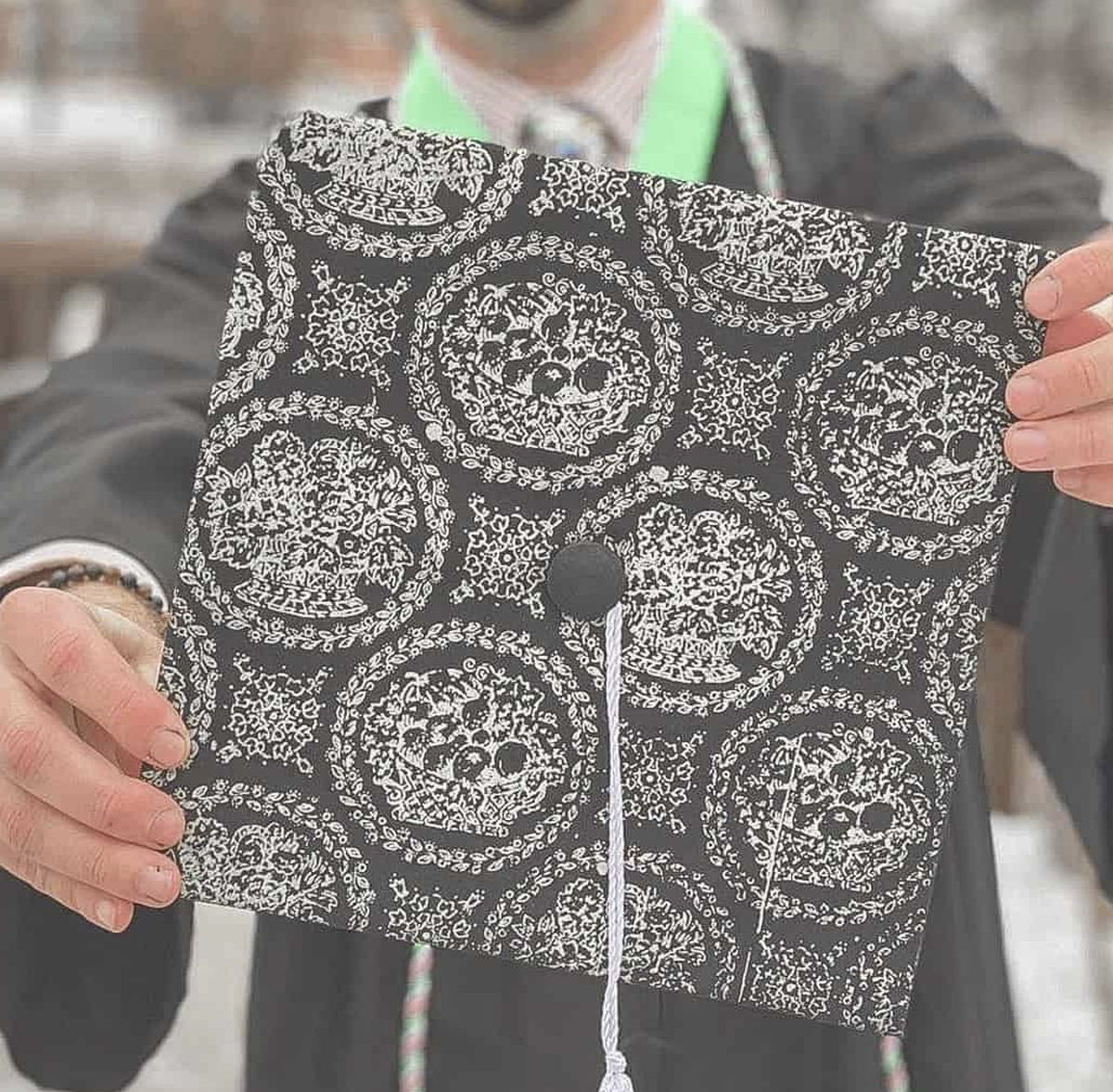 Graduation cap with a mandala design in black and white