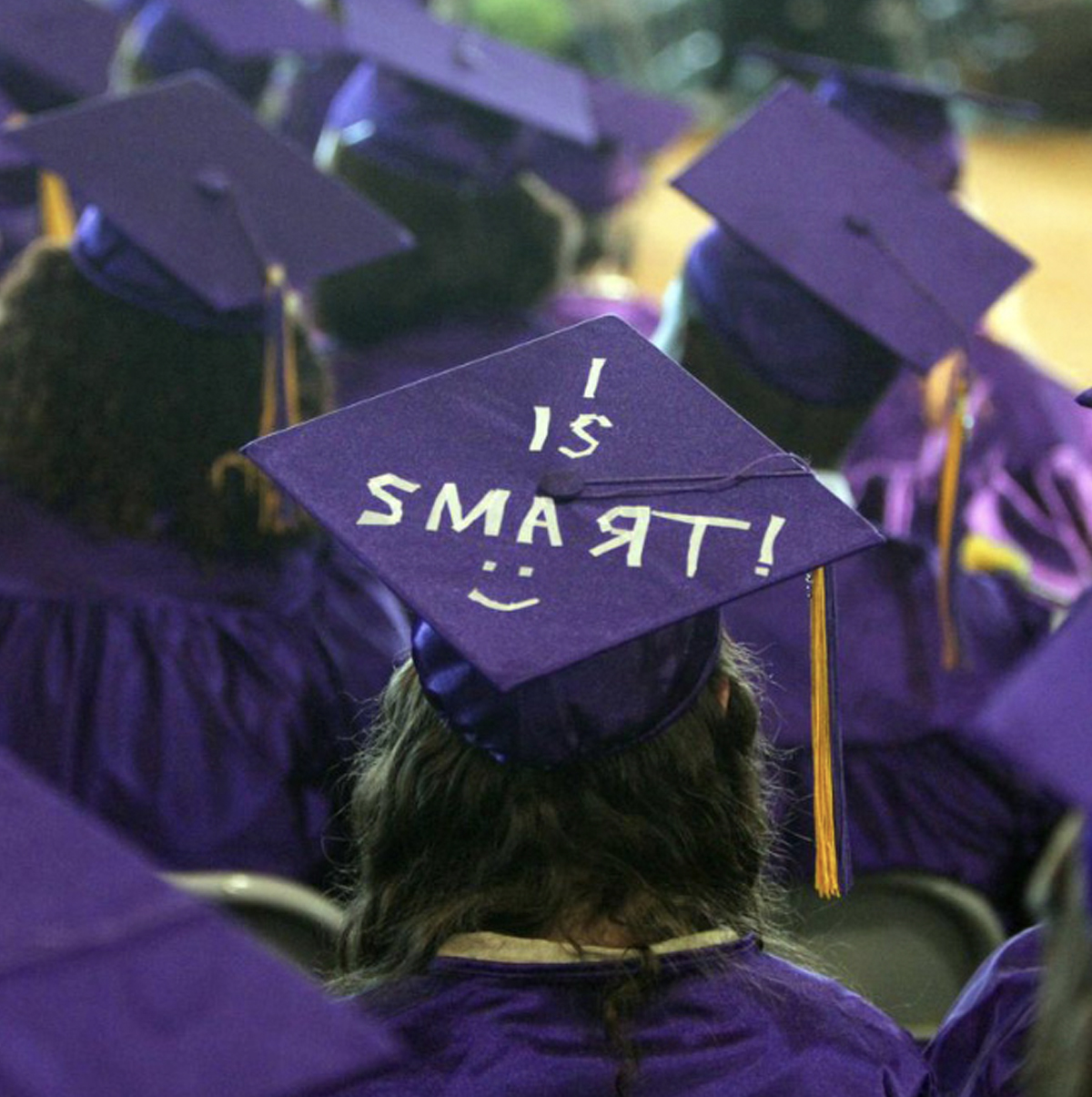 Purple graduation cap with funny quote "I is smart"