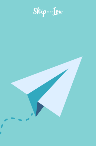 Image shows a drawing of a paper plane on top of a blue background.