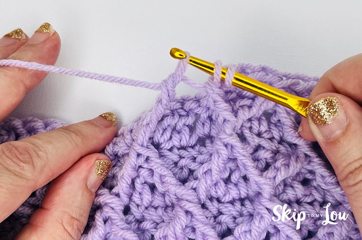 Step 2.6 – Yarn over and pull through the remaining loops
