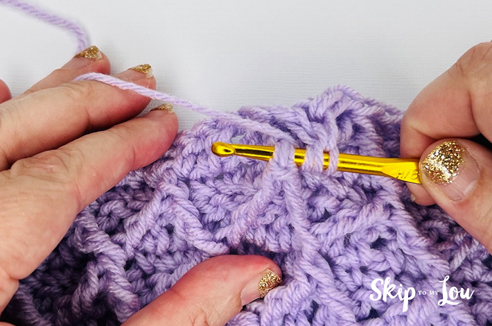 Step 1.2 – Insert hook around post two rows below
