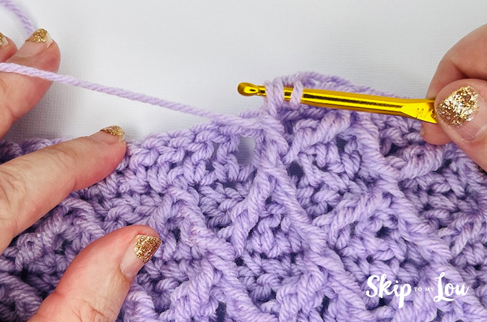 Step 1.5 – Pull through two loops, leaving three loops