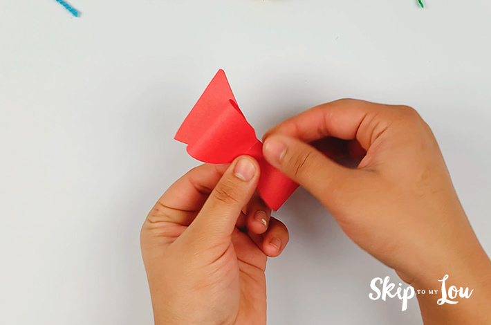 The bow tie shape is formed.