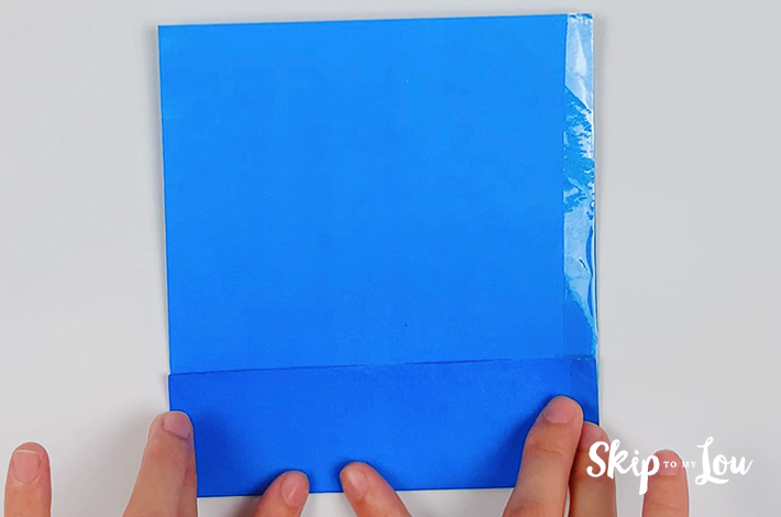 A small section of the bottom part of the paper is folded upwards.