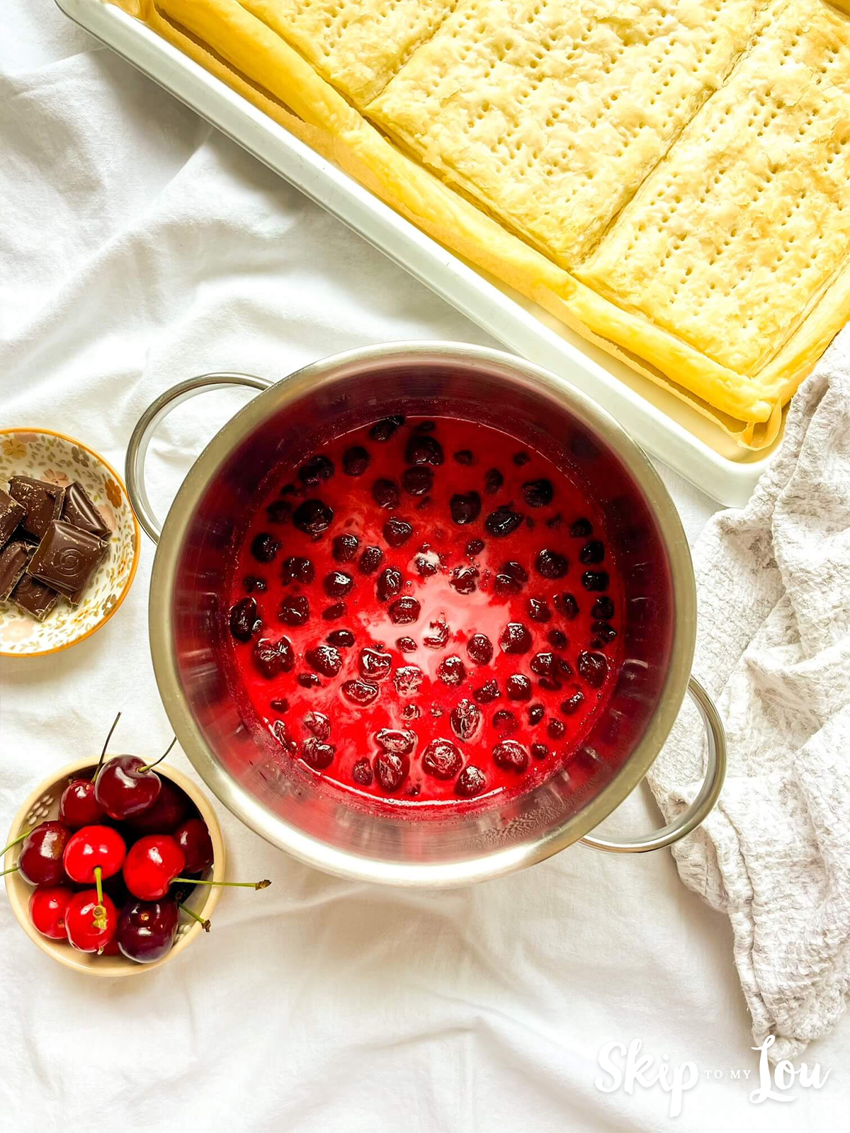 Cornstarch slurry added to the cherry mixture in the saucepan. 