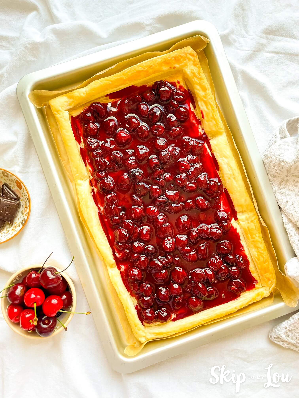 Cherries added to the cooked puff pastry. 