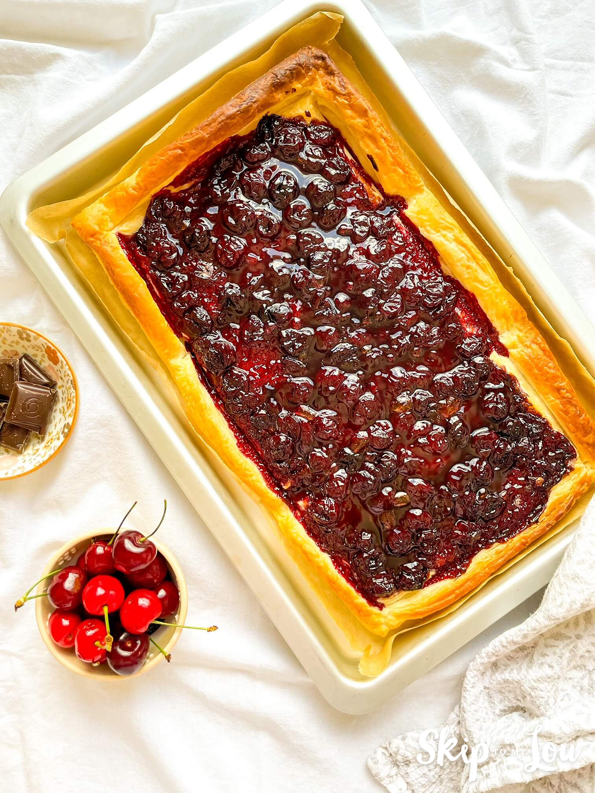 Puff pastry and cherries after being returned to the oven and cooked for 15 more minutes. 