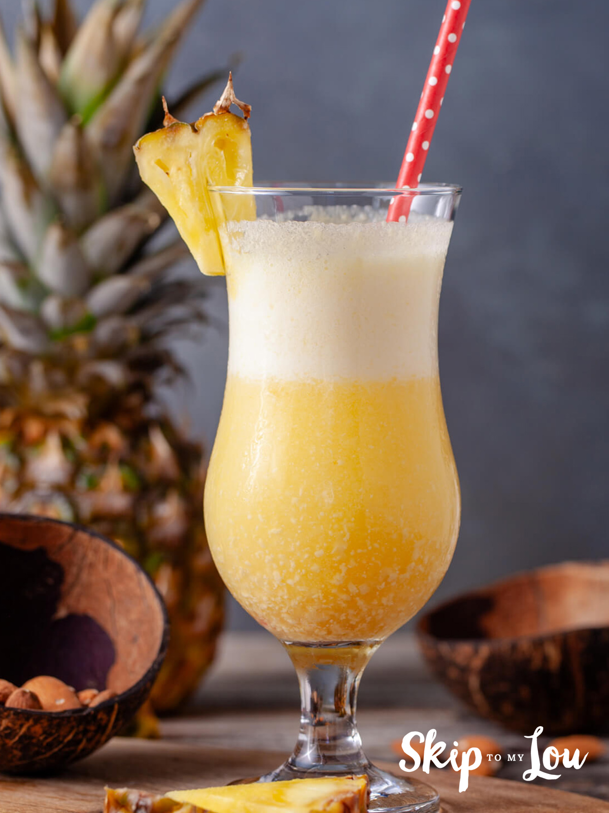 Frozen pina colada served in a tall glass.
