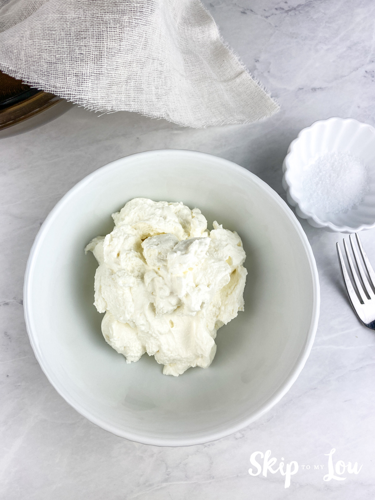 Greek yogurt in a white bowl.