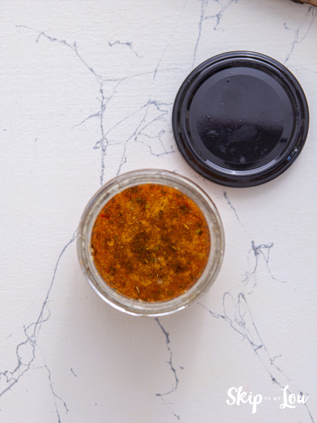 A bowl containing the vinaigrette ingredients.