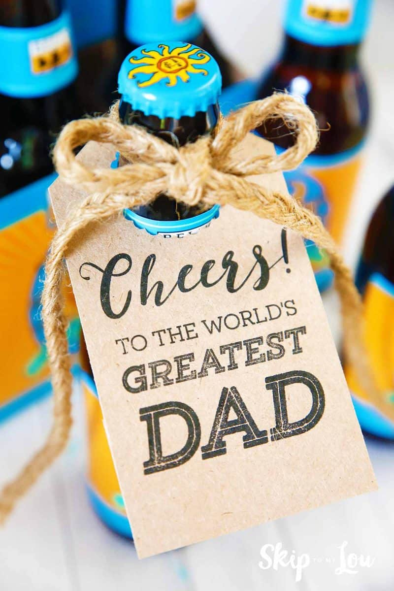 A bottle with a printable father's day tag attached.