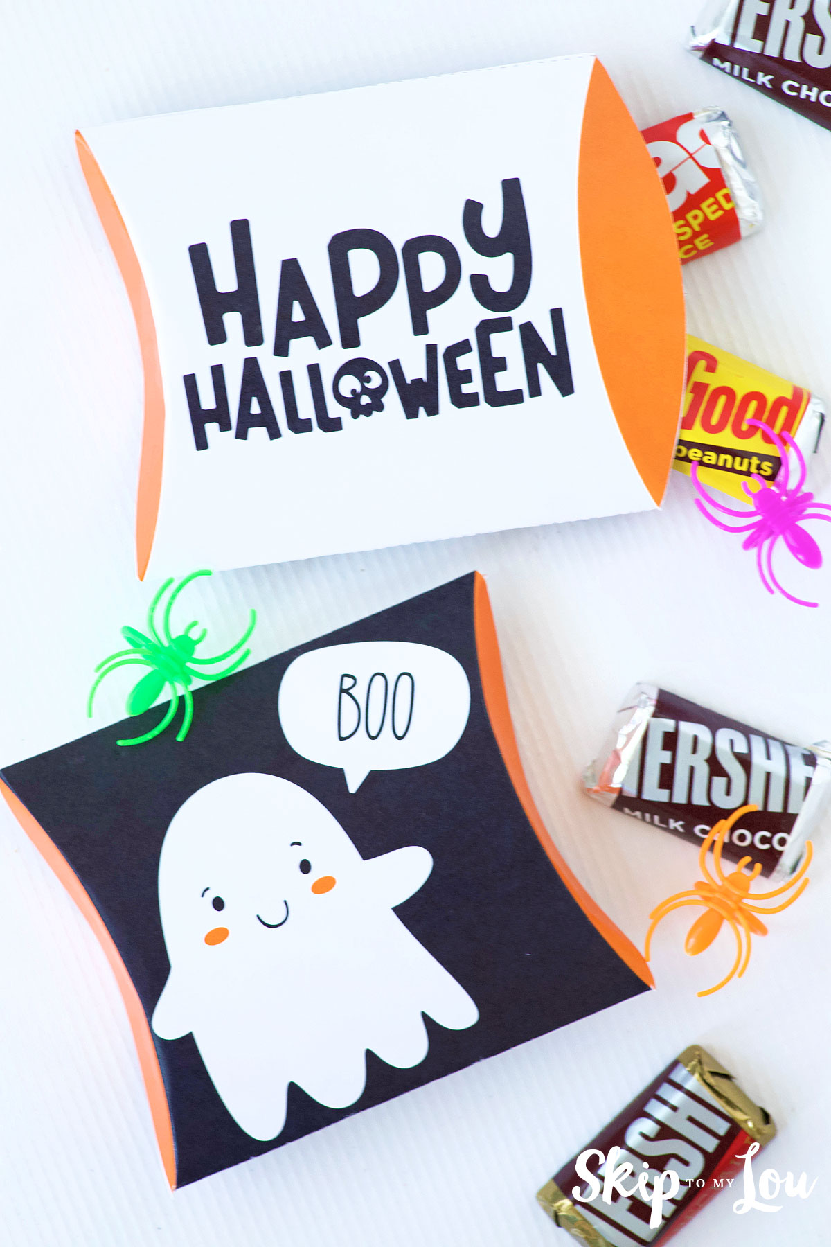 printable halloween pillow boxes filled with mini candy bars and spider rings