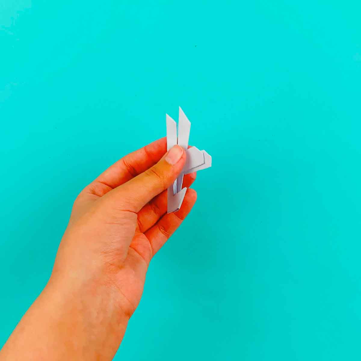 cut paper snowflake ready to be open