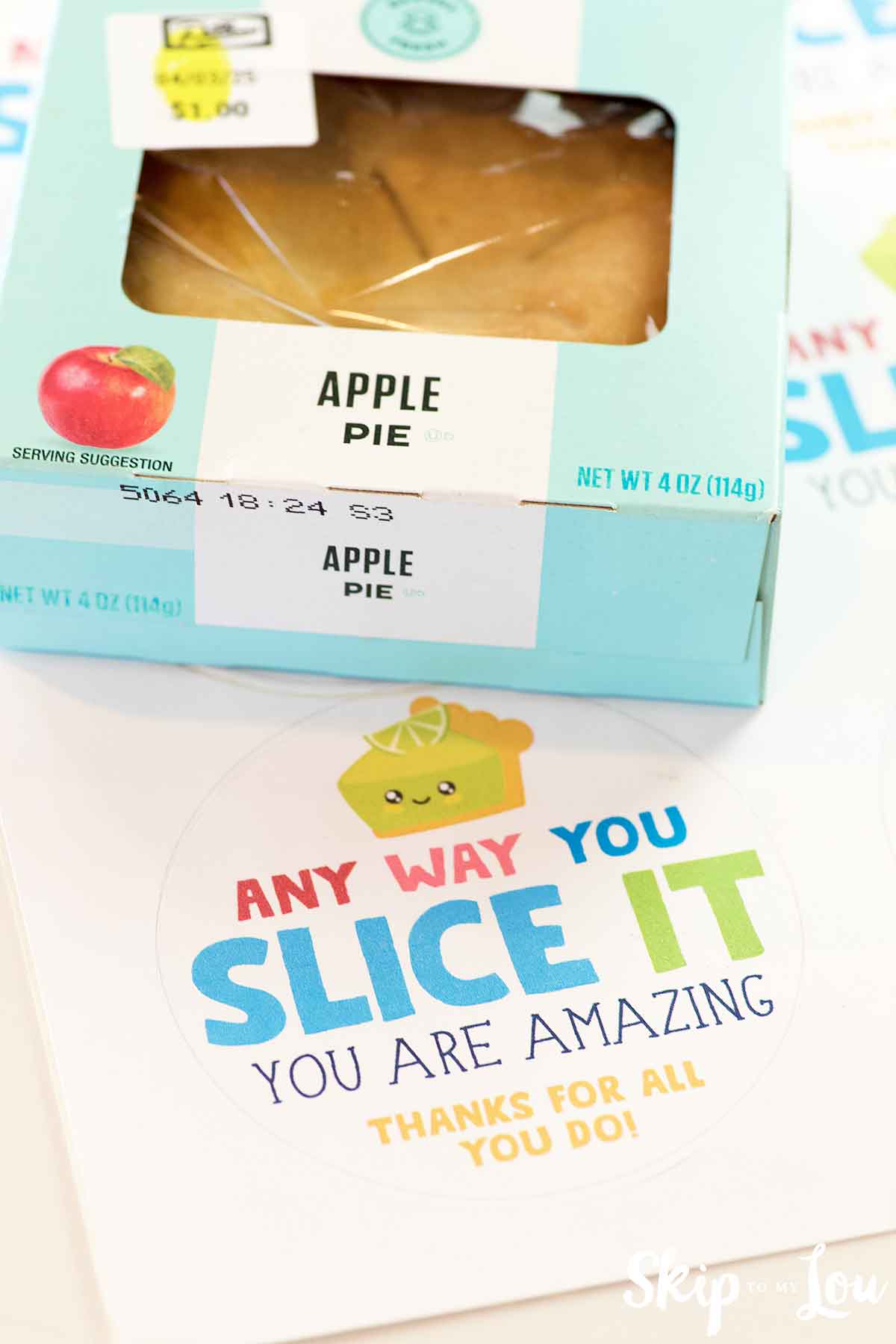 mini pie with label sitting next to it