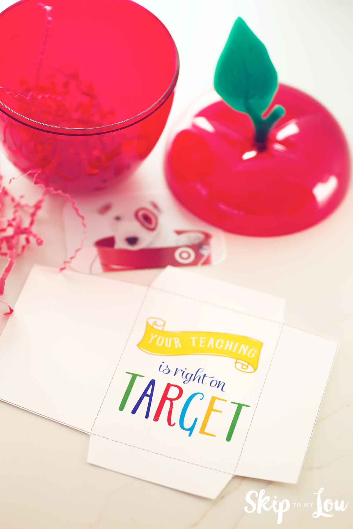 target gift card in cute printable holder that says your teaching is right on target inside an open plastic apple