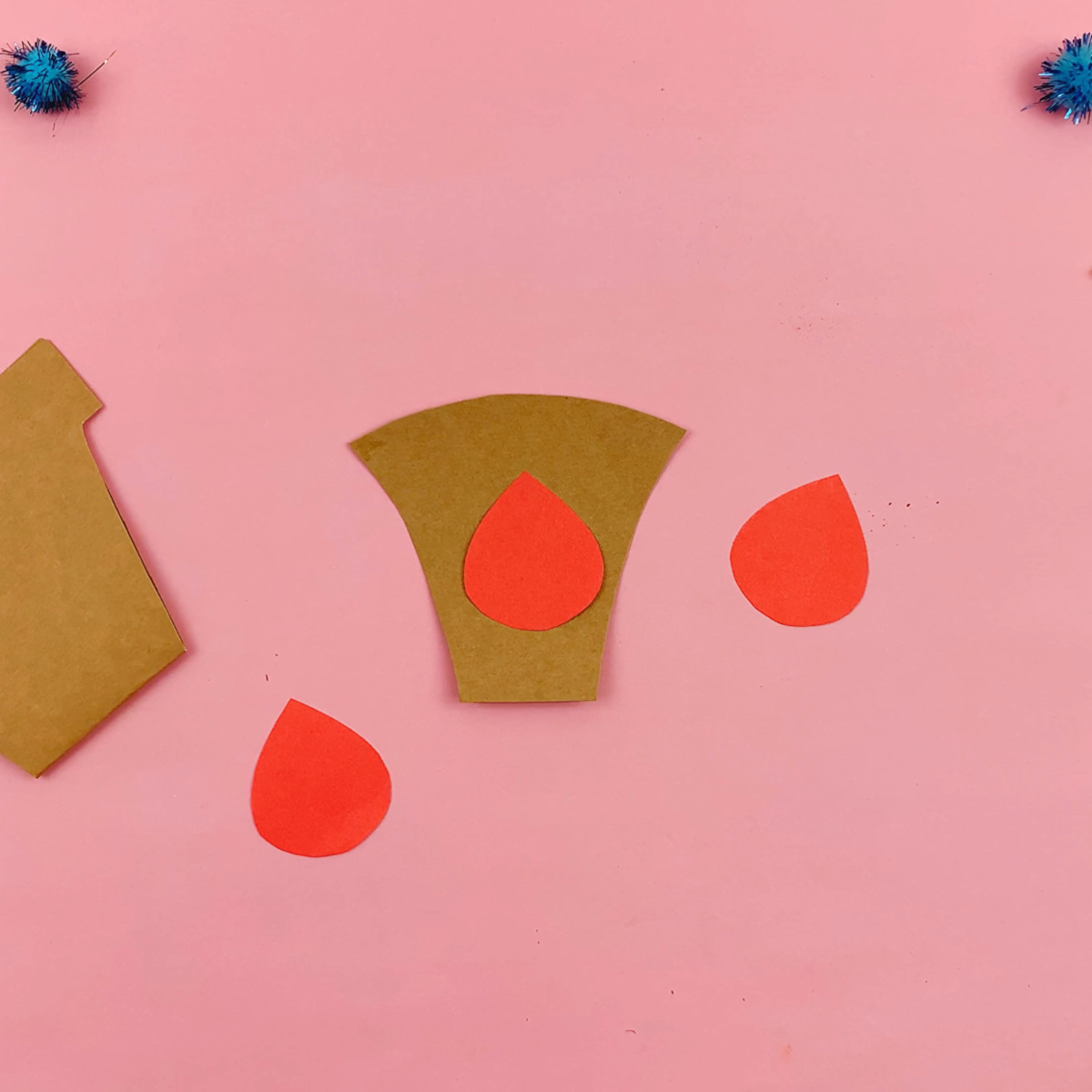 The tear drop template is used to make the tulip leaves from red paper.