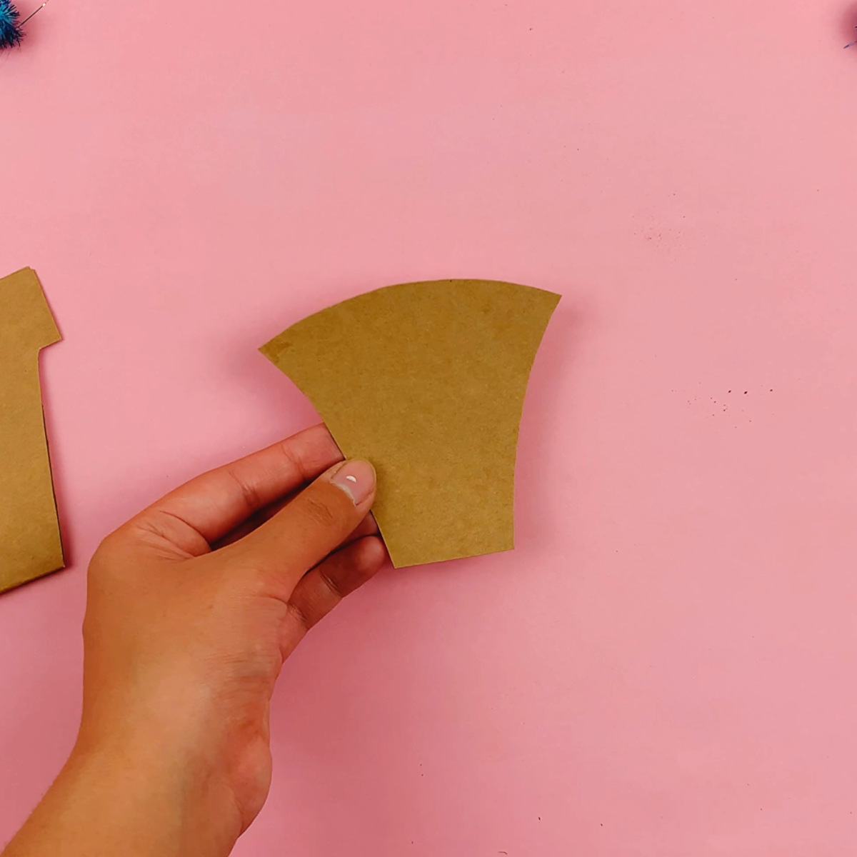 The flowerpot template cut out from cardstock.