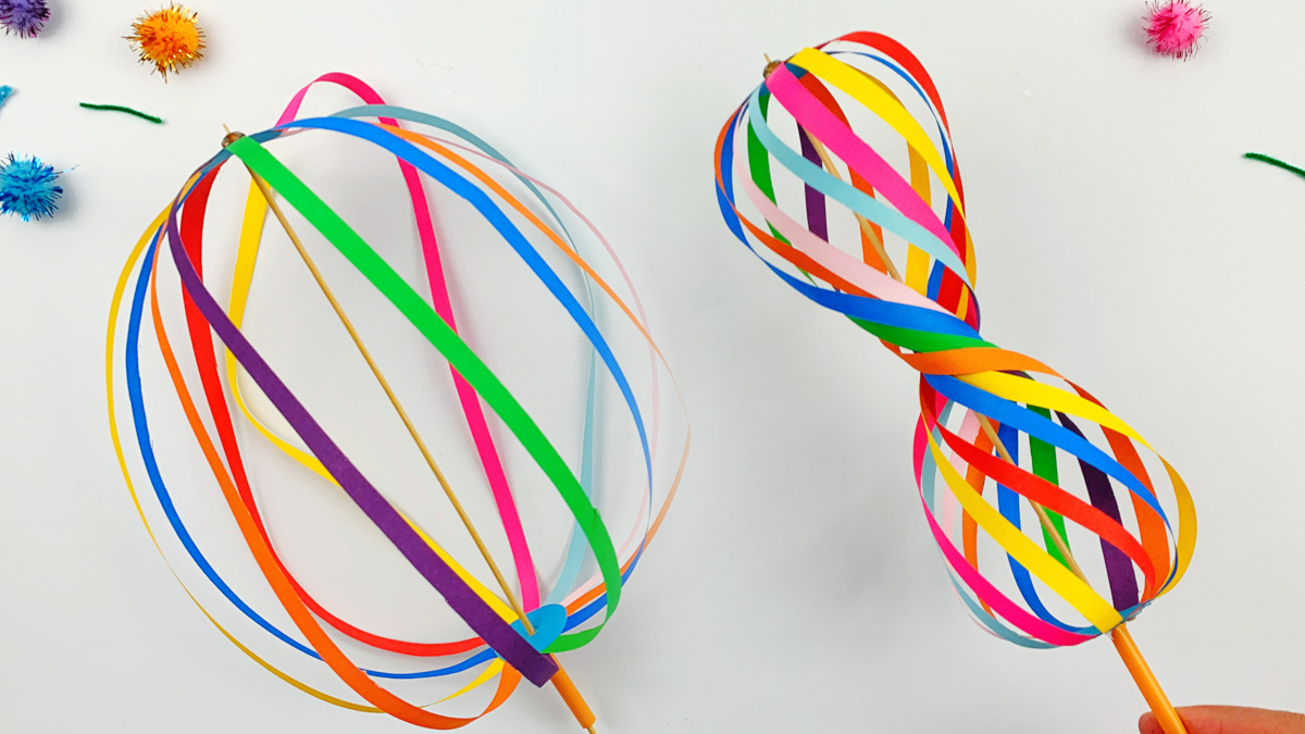 A rainbow spinner made with instructions from Skip to My Lou.