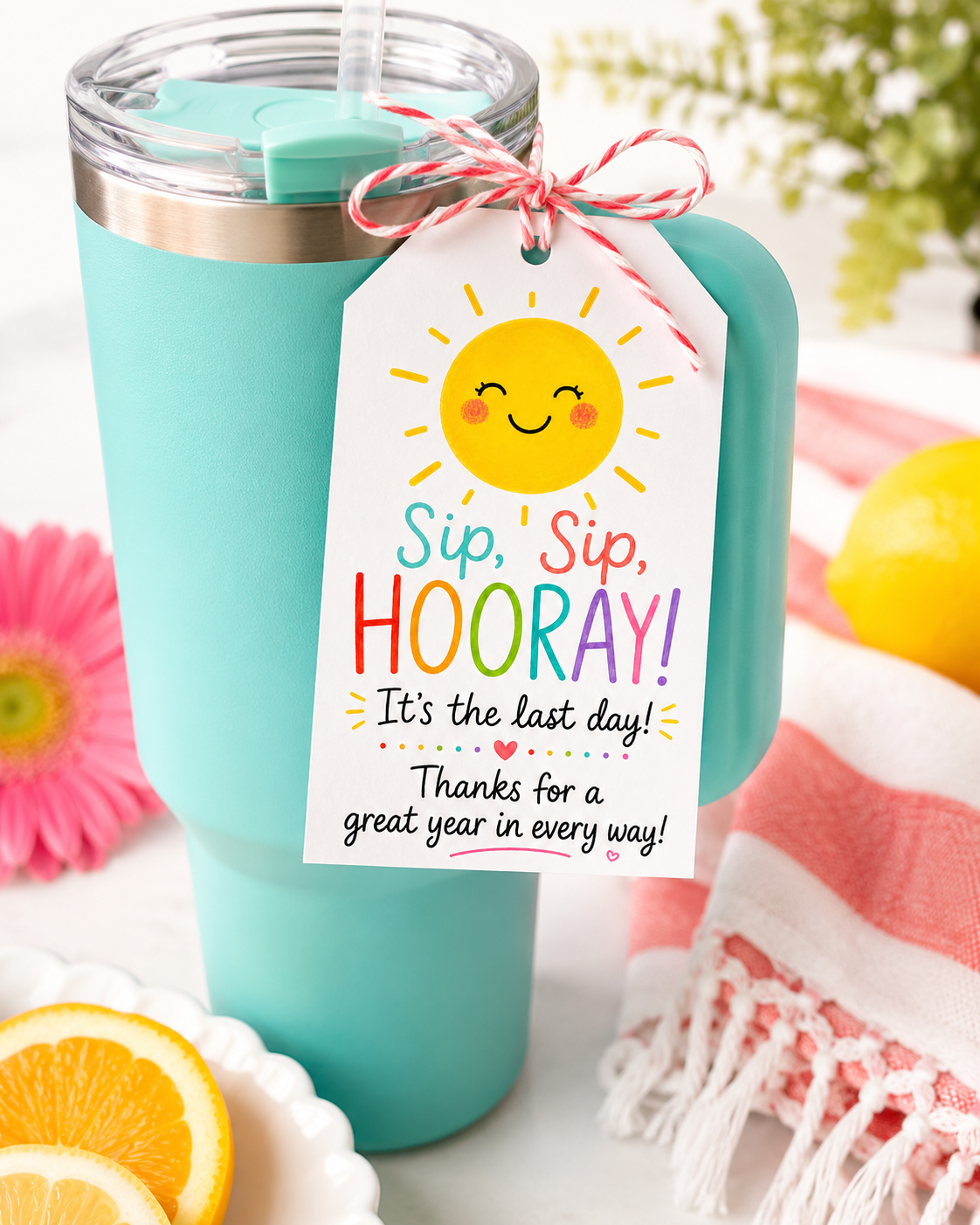 stanley cup with sip sip hooray tag tied to the handle for end of year teacher gift