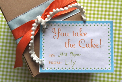 you take the cake gift tag attached to bakery box filled with a bundt cake